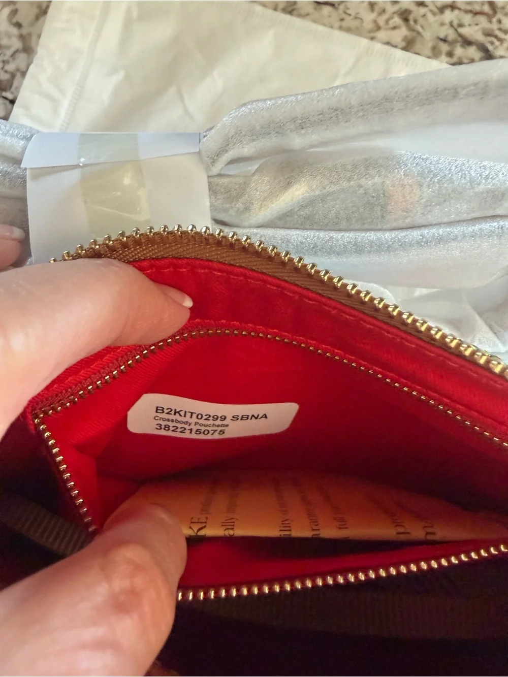 Dooney & Bourke features plaque
